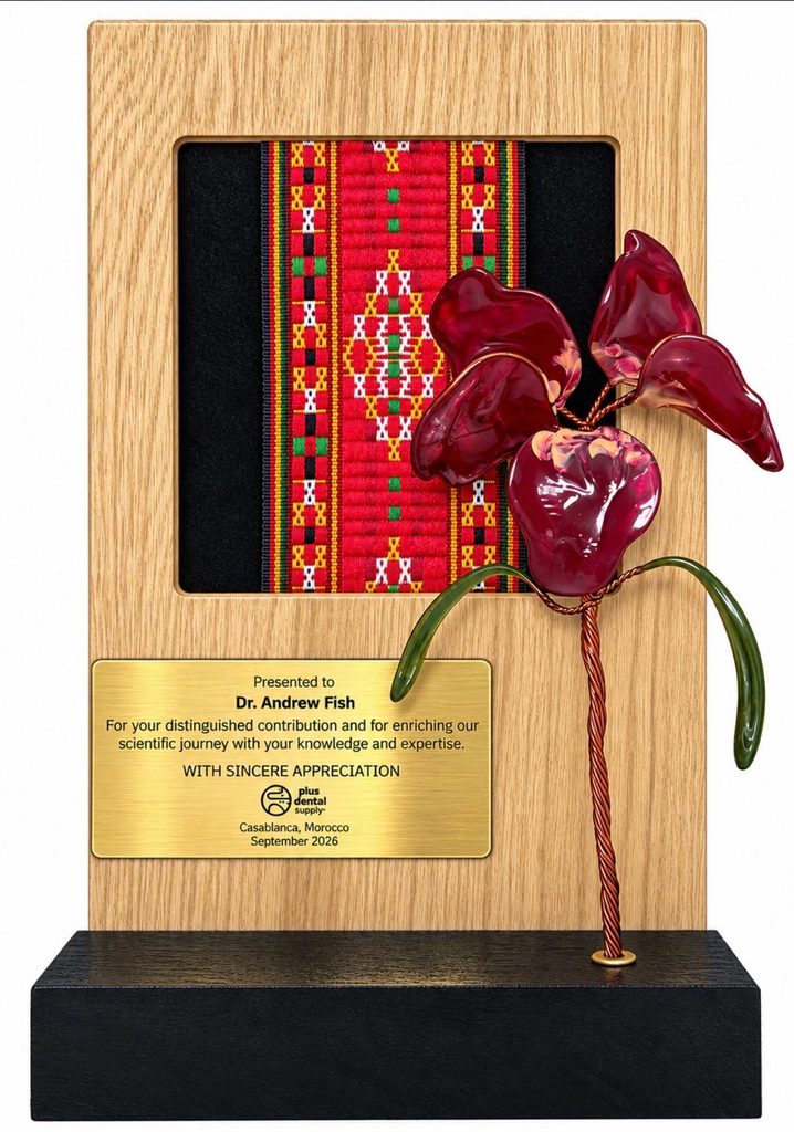 Award presented to Dr Andrew Fish lecturing on dental implants in Casablanca, Morocco